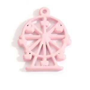 Vue détaillée d'une breloque grande roue rose pour bijoux DIY et accessoires