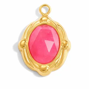 Close-up of a pink faceted natural stone pendant in a gold stainless steel frame