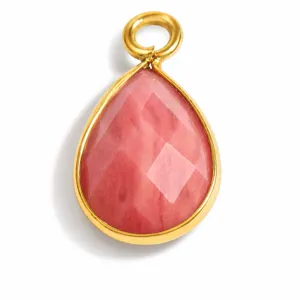 Close-up of pink faceted teardrop gemstone pendant in gold stainless steel frame.