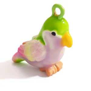 Macro view of colorful dopamine bird pendant featuring a vibrant gradient finish