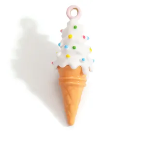 Macro view of a colorful soft-serve ice cream cone resin pendant for DIY jewelry making