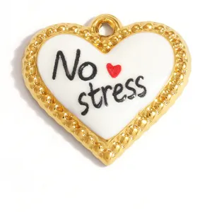Detailed macro view of heart-shaped stainless steel pendant with 'No stress' text
