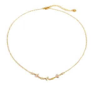 Collar vintage de acero de titanio chapado en oro con delicados colgantes de flores de circonio