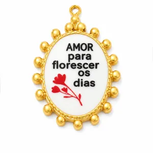 Close-up view of oval gold stainless steel pendant with AMOR text and red flower detail
