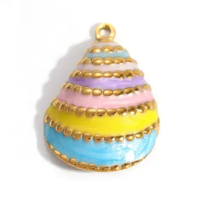Detailed macro view of a colorful striped stainless steel pendant with gold plating