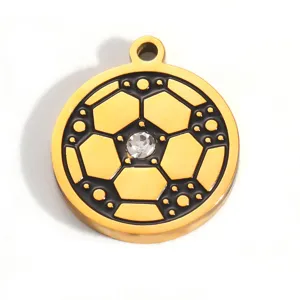 Close-up of gold-plated stainless steel soccer pendant with central rhinestone detail