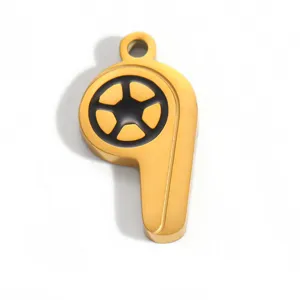 Detailed macro view of the gold-plated whistle-shaped stainless steel pendant for DIY jewelry