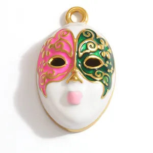 Detailed view of a colorful opera mask pendant with gold-plated stainless steel accents.