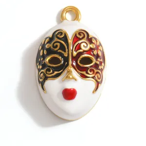 Exquisite close-up detail of a gold-plated stainless steel opera mask pendant accessory.