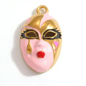 Detail showing the intricate pink enamel and gold plating on the punk mask pendant