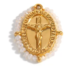Detailed macro view of gold-plated titanium steel crucifix pendant with white beads
