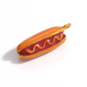 Detailed view of a 3D hot dog pendant accessory with orange and red enamel
