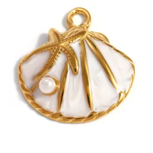 Detail view of a gold-plated shell pendant with a white enamel finish and starfish accent
