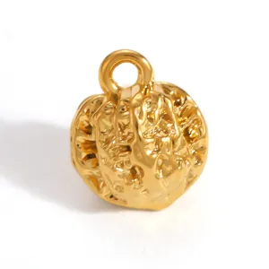 Detailed view of a gold-plated walnut-shaped pendant with realistic metallic texture.