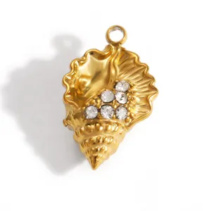 Close-up of gold-plated stainless steel shell pendant with sparkling rhinestones for DIY