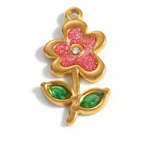 Gold plated titanium steel flower pendant with pink glitter and green leaf crystals