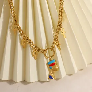 Detailed view of vintage gold 18k plated stainless steel necklace with Nefertiti and Ankh