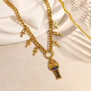 Close-up detail of gold-plated stainless steel Egyptian necklace with Ankh cross charms