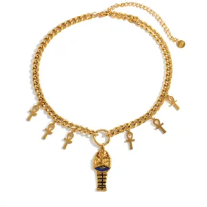 Detailed view of gold-plated stainless steel necklace with Pharaoh and Ankh charms