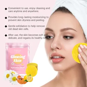 Exfoliating facial cleansing pad detail showing gentle textured surface and turmeric formula.