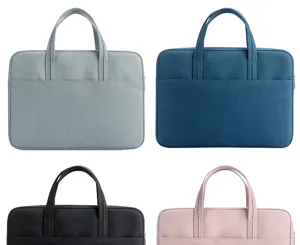 Detailansicht mehrfarbiger Laptoptaschen und Aktentaschen mit doppelten Griffen und Taschen.