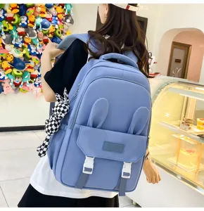 Sac à dos d'école bleu clair élégant avec oreilles de lapin et grande capacité pour filles