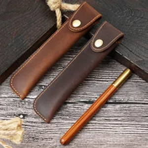 Genuine leather pen sleeve detail shot, vintage handmade cowhide stationery protective case