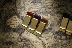 Brass metal money clip and bookmark with embossed leather design for traveler notebook.