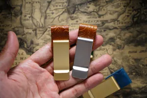 Stainless steel brass money clip featuring embossed floral leather detail for notebook bookmarks.