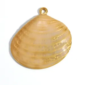 Detailed view of a textured gold stainless steel scallop shell pendant for DIY jewelry
