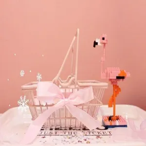 Detailed shot of the pink storage basket featuring a sweet bow and aesthetic pink theme setup.