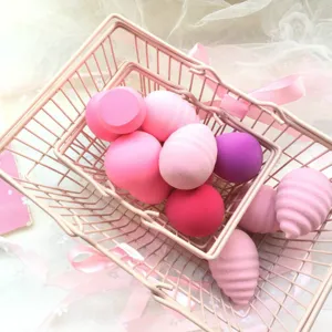 Cute mini shopping cart with colorful makeup sponges, soft beauty blender set for daily use.