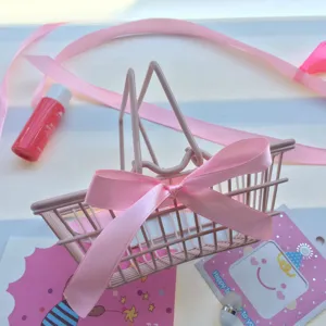 Pink mini shopping cart metal desktop storage basket cute bowknot decoration detail view