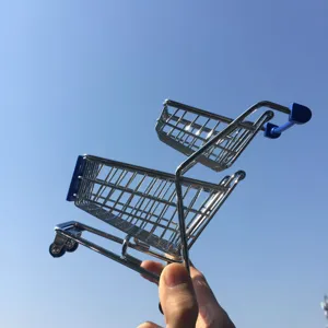 Mini double-layer metal shopping cart desktop storage organizer and creative photo prop.
