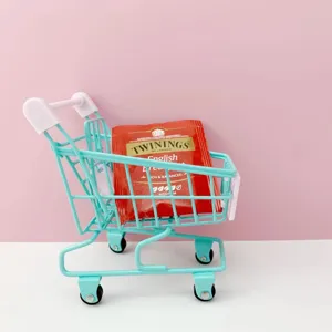 Mini metal shopping cart ornament, cute desktop storage basket model, cyan color creative prop.
