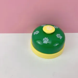 Pet training bell with cute paw prints, ideal for interactive dog and cat training games.
