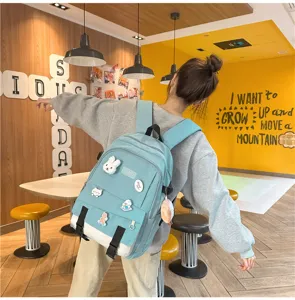 Vue détaillée d'un sac à dos décontracté bleu clair de grande capacité pour jeunes filles
