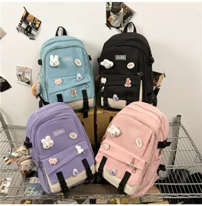 Série de quatre sacs à dos décontractés à grande capacité pour étudiants en tons pastels