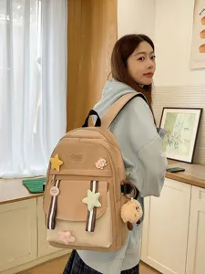 Modischer khakifarbener Schulrucksack für Mädchen mit flauschigen Sternen-Anhängern