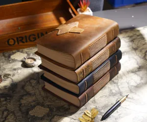 Handcrafted genuine leather journal notebook A5 vintage diary notepad with rustic stitched cover.