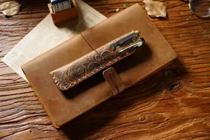 Vintage genuine leather pen pouch and notebook set, handmade embossed stationery gift.