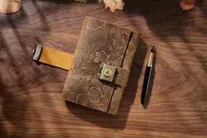 Vintage embossed leather notebook with password lock, retro diary journal for daily use.