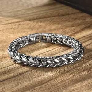 Close-up macro detail of a high-polished stainless steel keel chain bracelet for men.