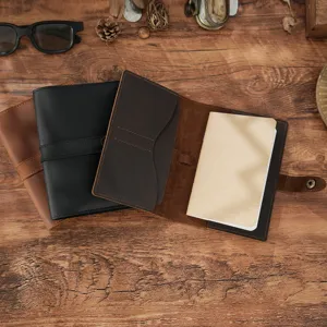 Vintage genuine leather travel journal notebook, handmade retro diary cover design, detail view.