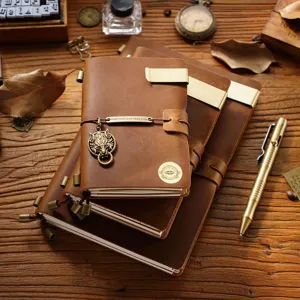 Vintage crazy horse leather traveler notebook retro journal diary with metal bookmark and pen.