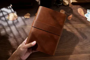 Vintage handmade genuine leather journal A5 loose-leaf notebook sketch diary detail shot.