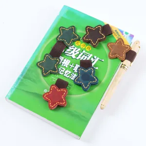 Set di segnalibri magnetici in vera pelle a forma di stella e portapenne per quaderni e diari.