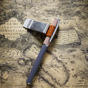 Vintage style stainless steel metal pen clip with leather loop for journal notebook and planner.
