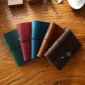 Handgemachte A6 Leder Loseblatt Notizbuch mit Riemen Vintage Tagebuch fuer taegliches Schreiben.
