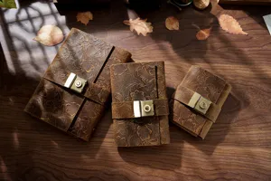 Vintage genuine leather journal notebook with combination lock, embossed diary sketching notepad.